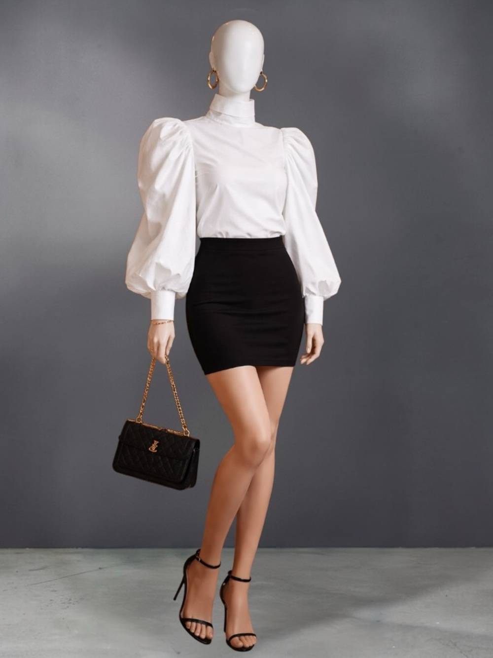 Swank A Posh “Jury’s Out Power Shoulder Top” Blouse
